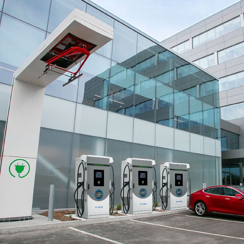 Commercial DC fast-charging bank outside an office building